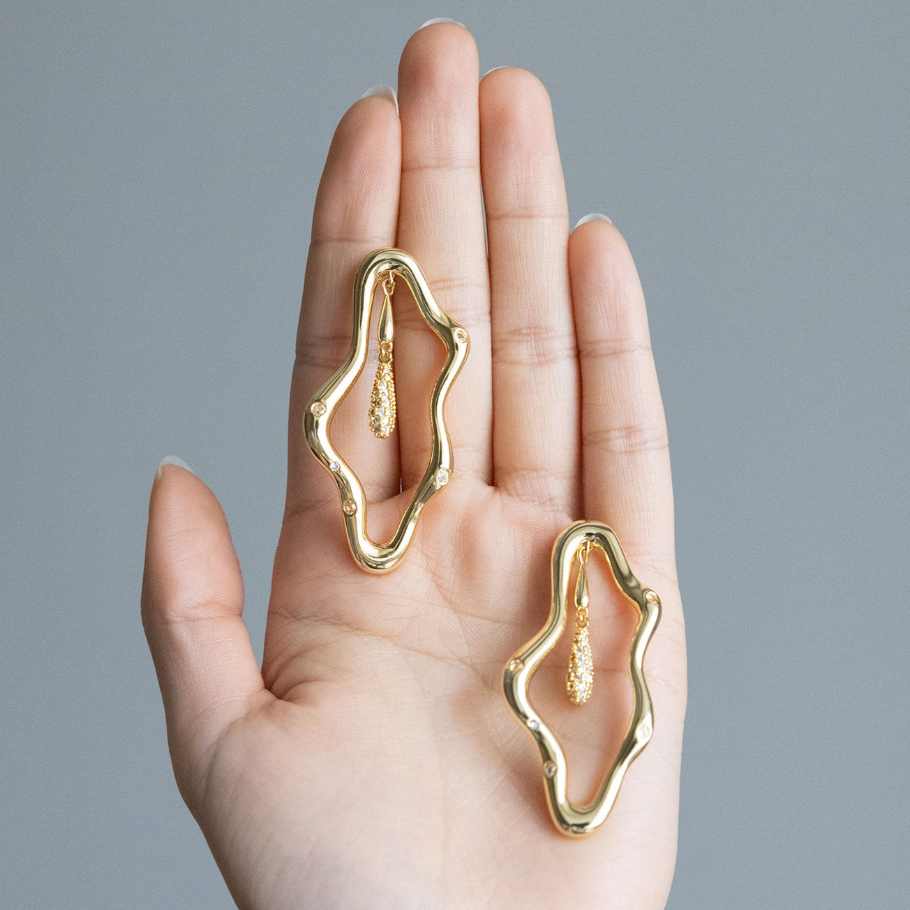 Zircon-encrusted sea wave wind chime earrings-Golden