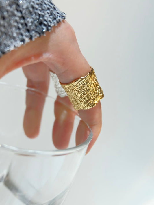 Volcanic rock texture with wide openings, bright golden